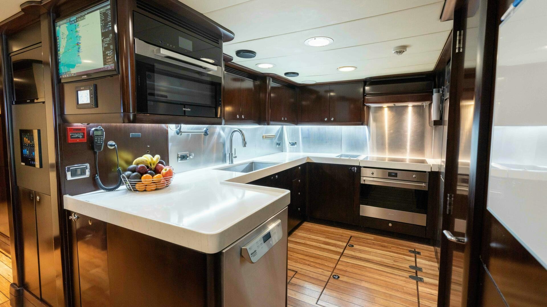 a kitchen with a stainless steel stove aboard ANEMOI Yacht for Sale