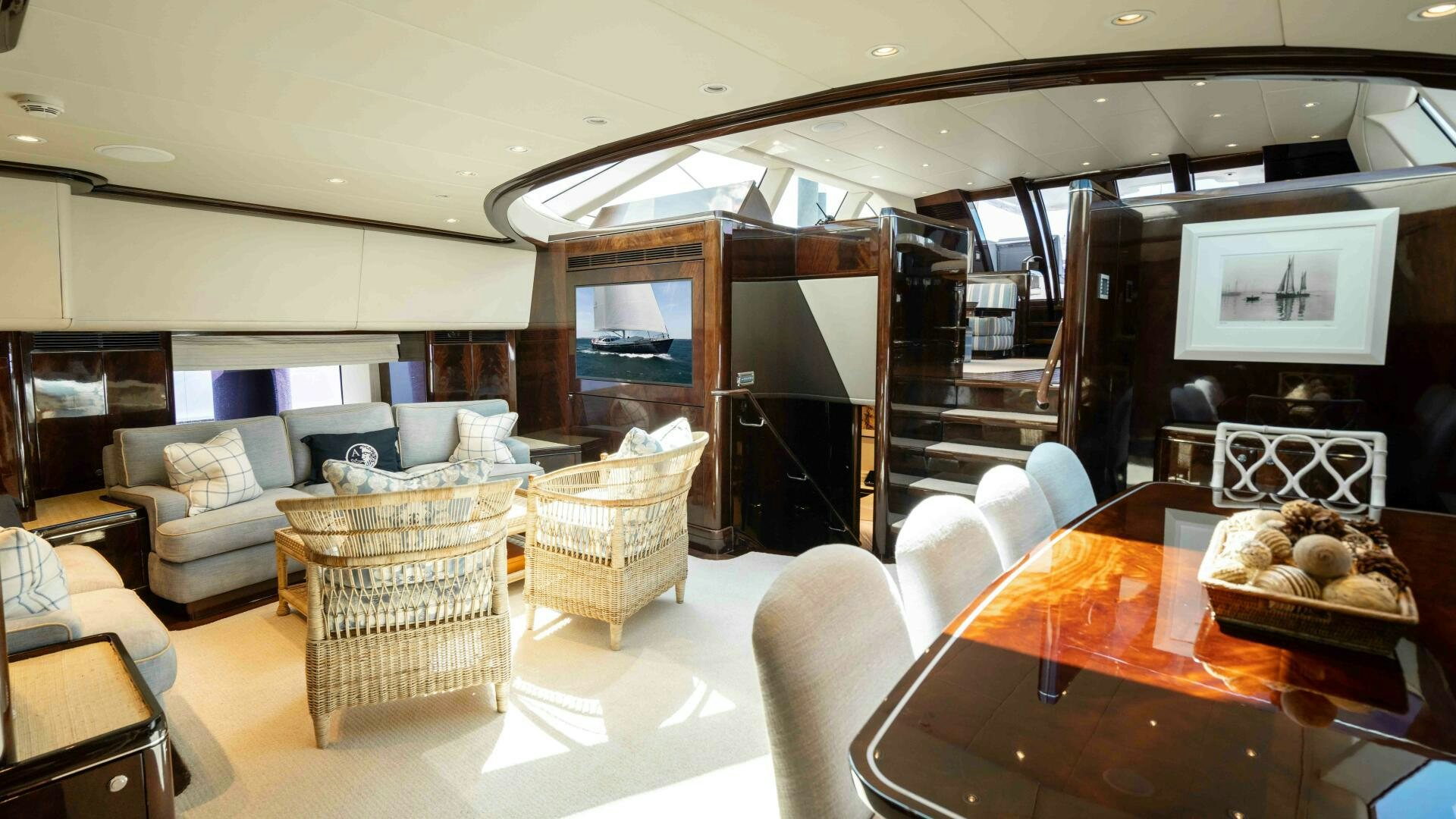a living room with a large fireplace aboard ANEMOI Yacht for Sale