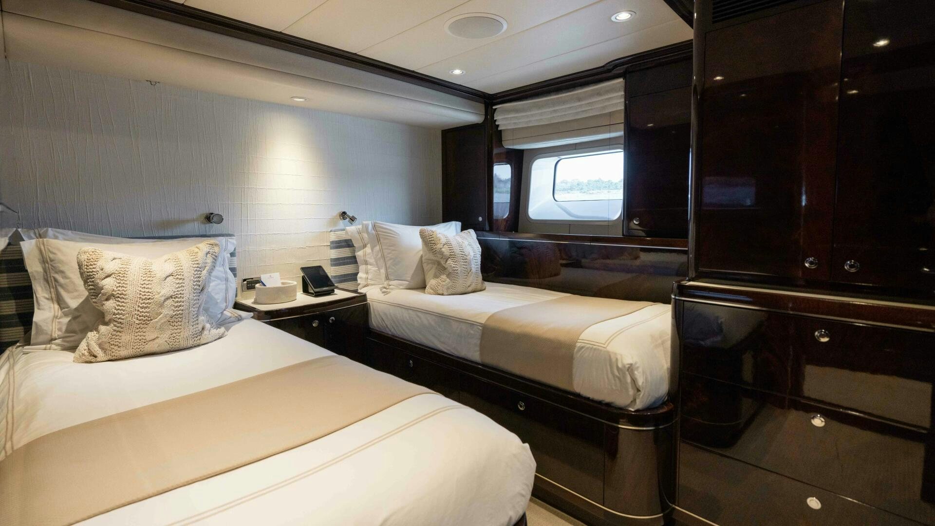 a couple of beds in a room aboard ANEMOI Yacht for Sale