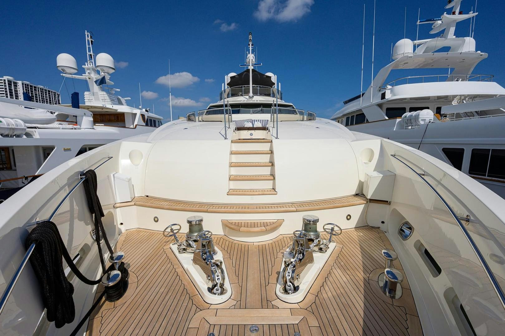 a large white ship with a deck aboard SULLIVAN'S ISLAND Yacht for Sale