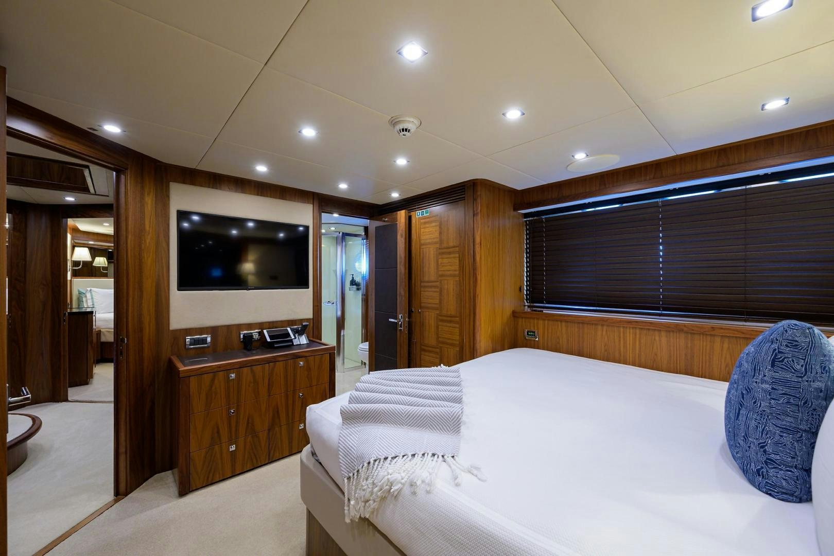 a bedroom with a large bed aboard SULLIVAN'S ISLAND Yacht for Sale
