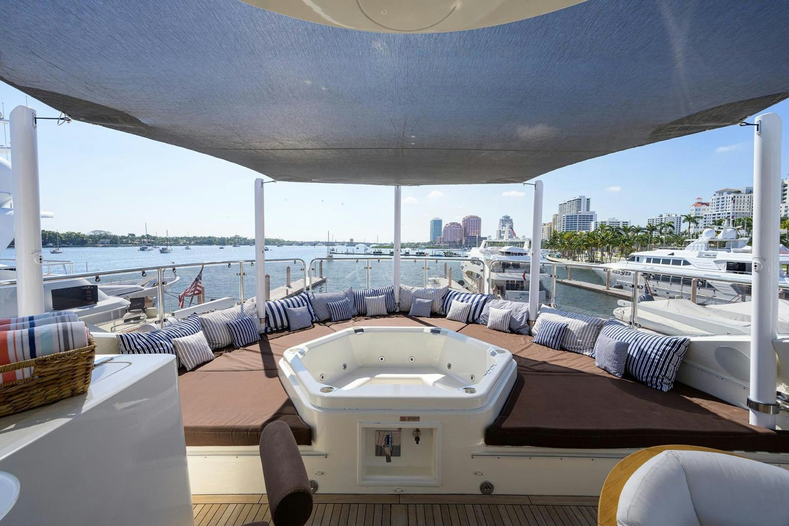 a room with a large window overlooking a city aboard SULLIVAN'S ISLAND Yacht for Sale