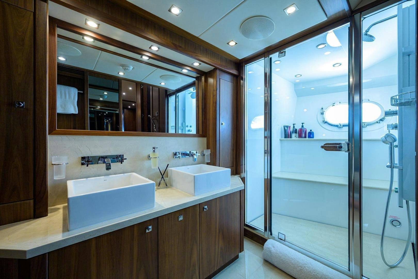 a bathroom with a large mirror aboard SULLIVAN'S ISLAND Yacht for Sale