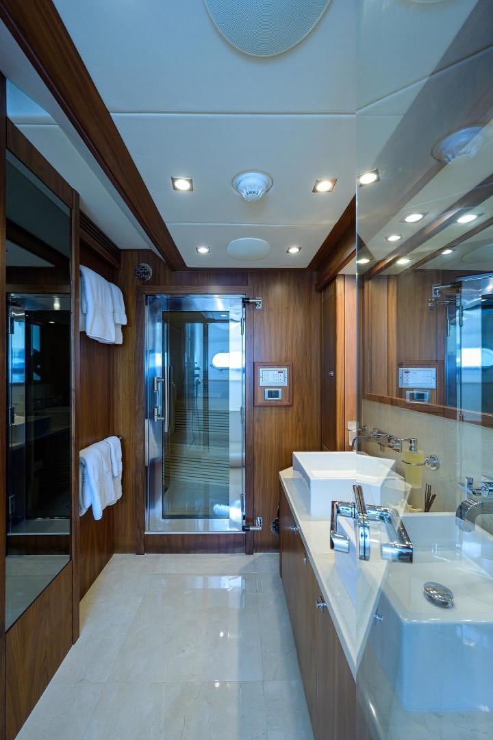 a bathroom with a large mirror aboard SULLIVAN'S ISLAND Yacht for Sale