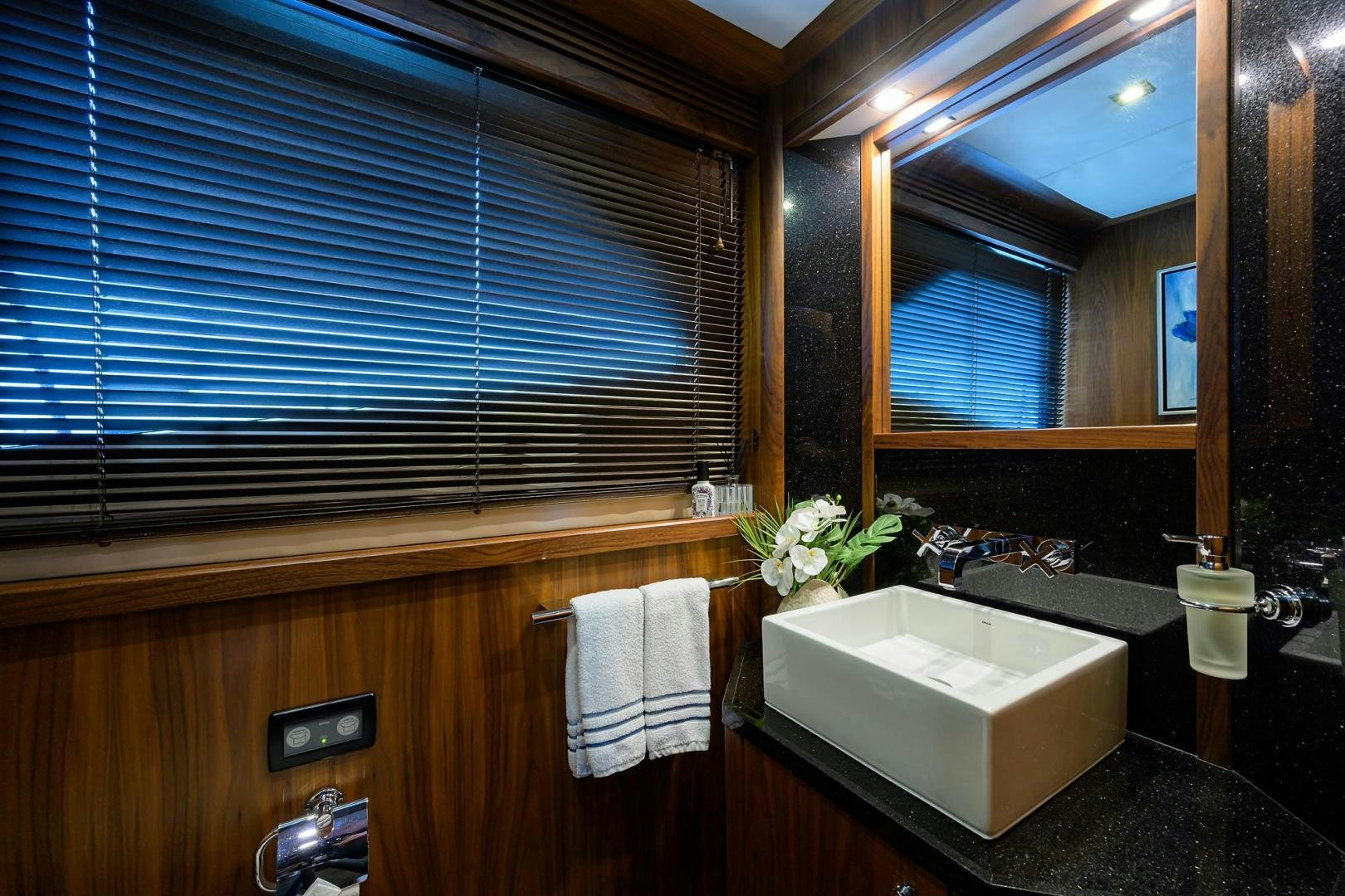 a bathroom with a large window aboard SULLIVAN'S ISLAND Yacht for Sale