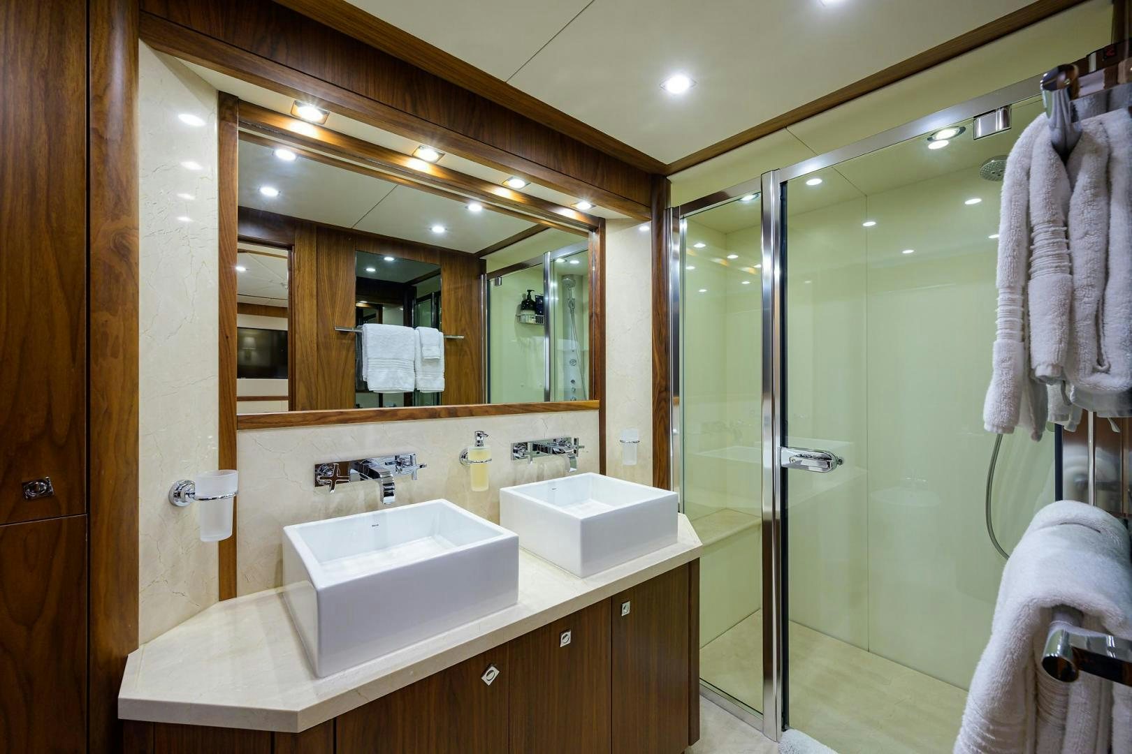 a bathroom with a sink and a shower aboard SULLIVAN'S ISLAND Yacht for Sale