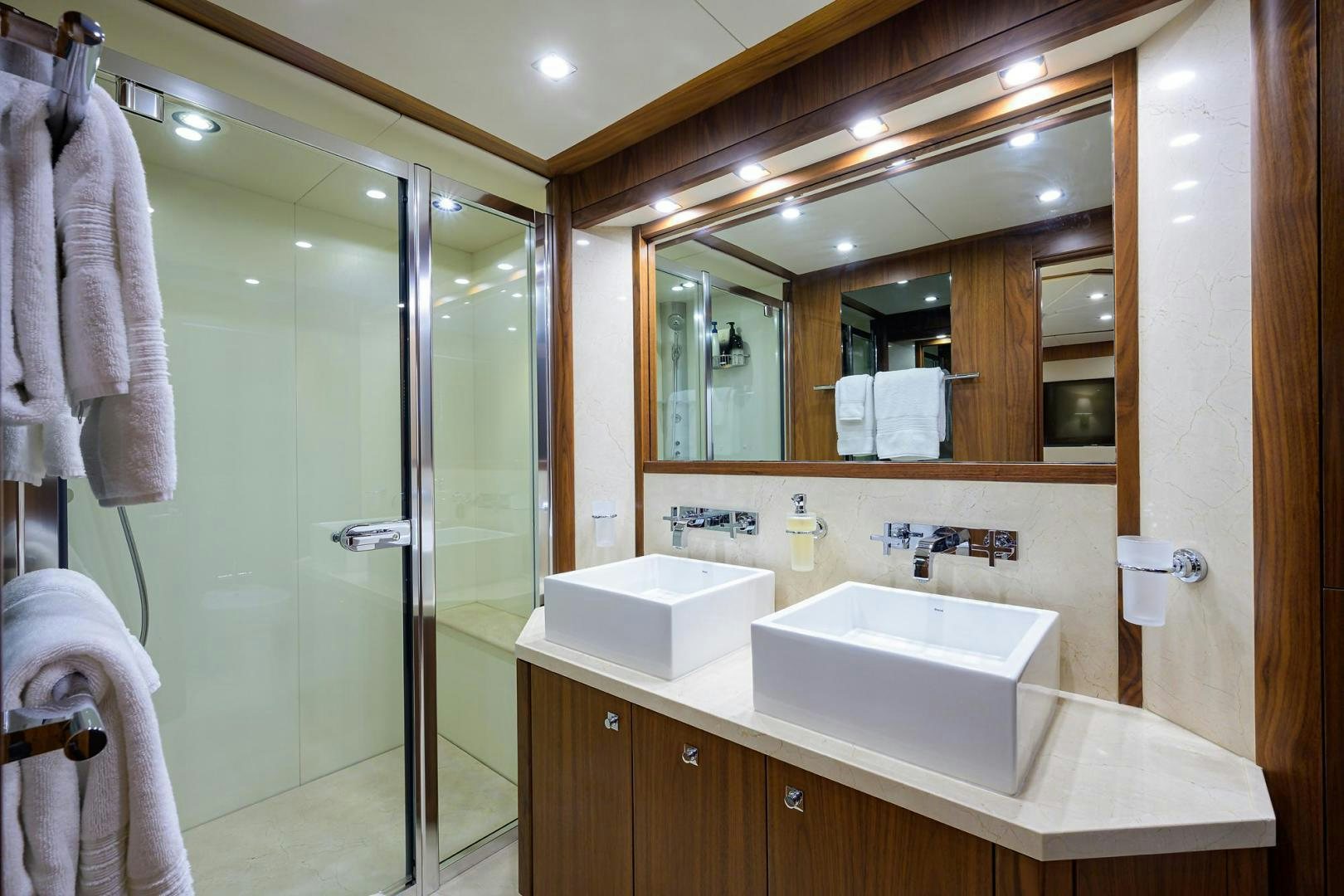 a bathroom with a glass shower aboard SULLIVAN'S ISLAND Yacht for Sale