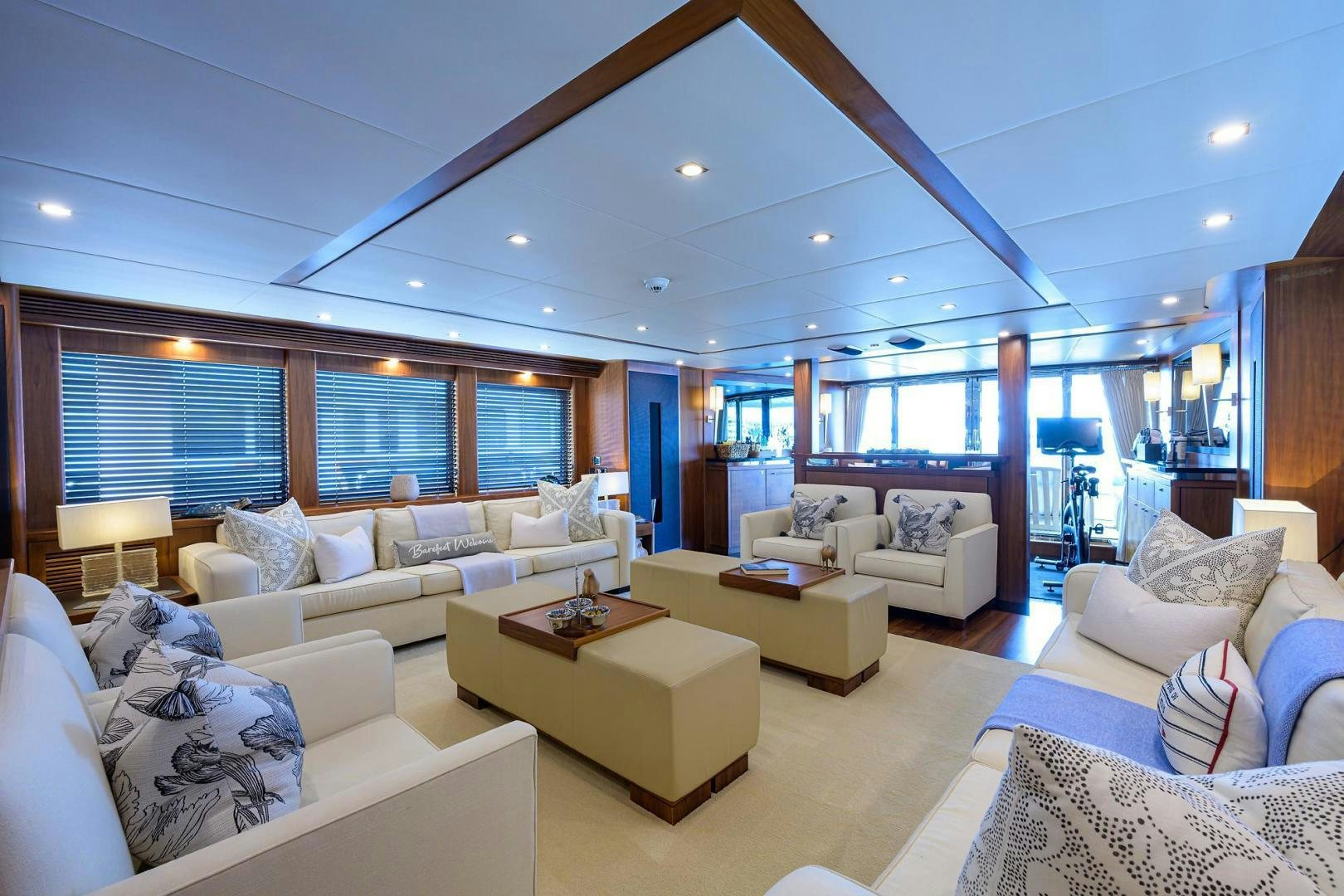 a living room with a large window aboard SULLIVAN'S ISLAND Yacht for Sale