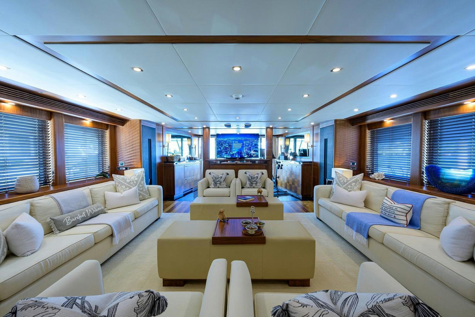 a living room with a large window aboard SULLIVAN'S ISLAND Yacht for Sale