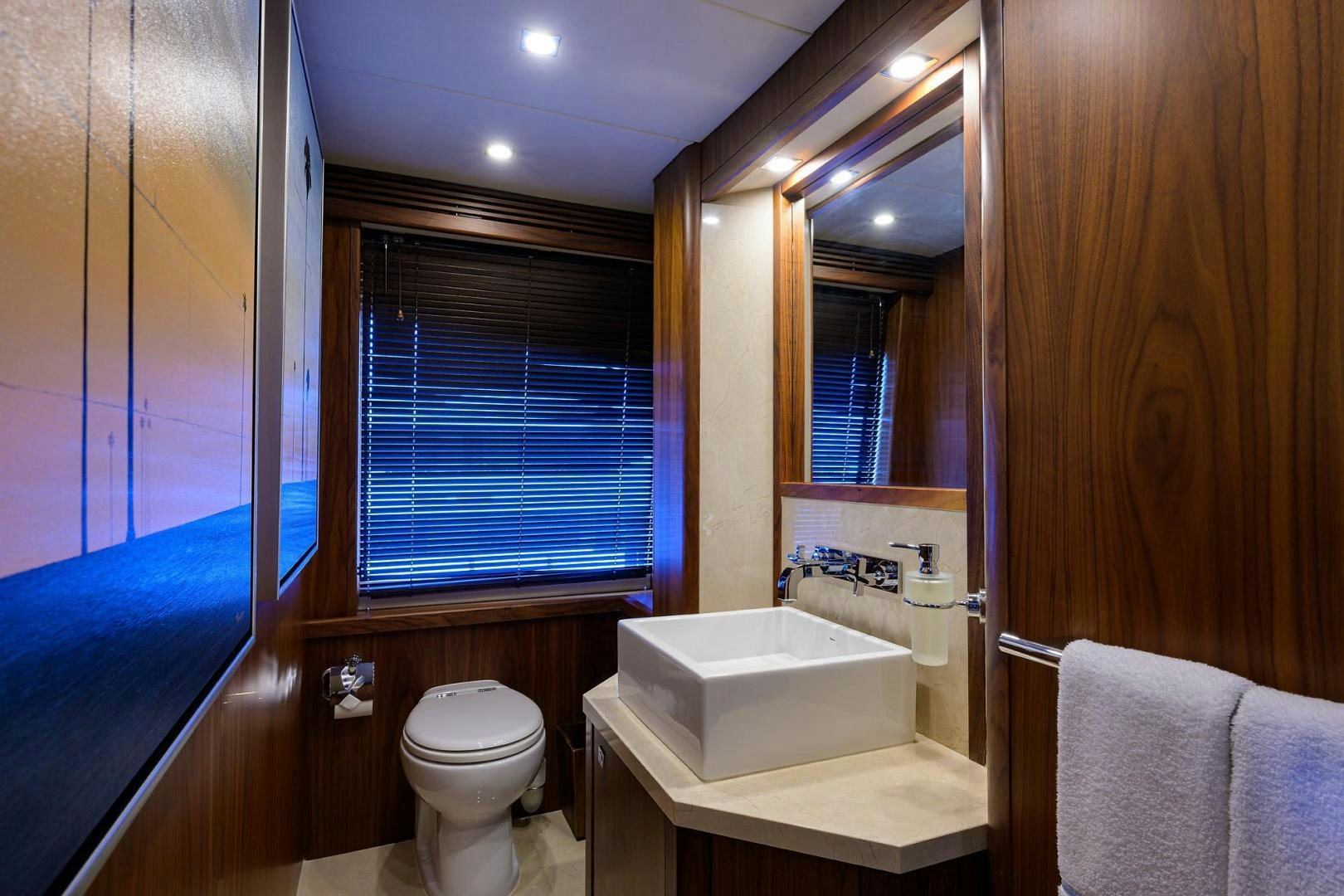 a bathroom with a sink toilet and a bathtub aboard SULLIVAN'S ISLAND Yacht for Sale