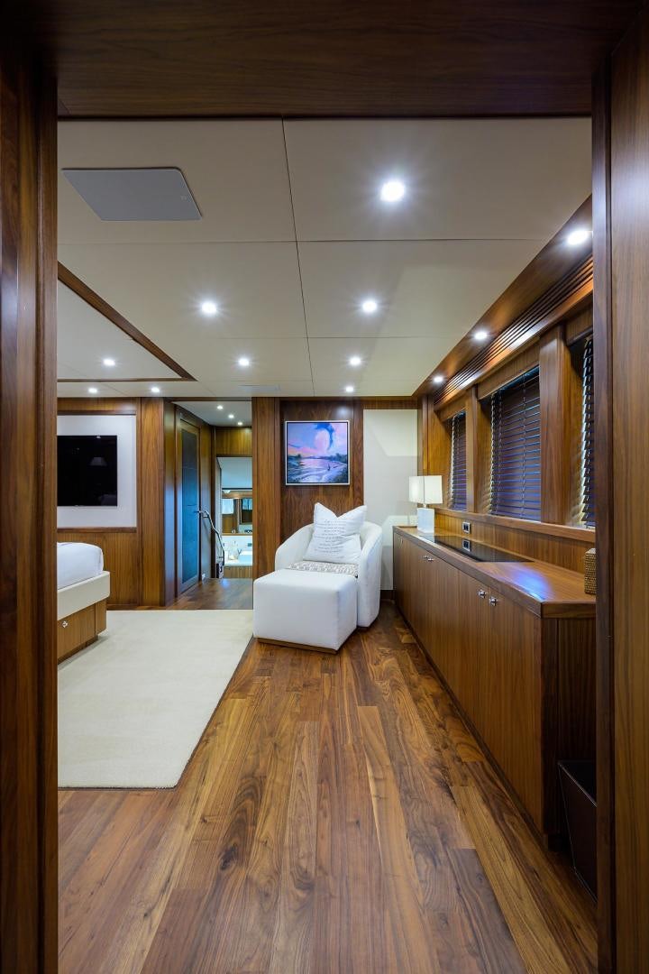 a large room with a wood floor aboard SULLIVAN'S ISLAND Yacht for Sale
