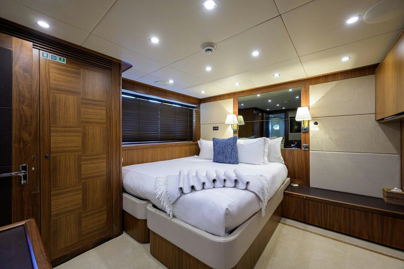 a room with a bed and a closet aboard SULLIVAN'S ISLAND Yacht for Sale