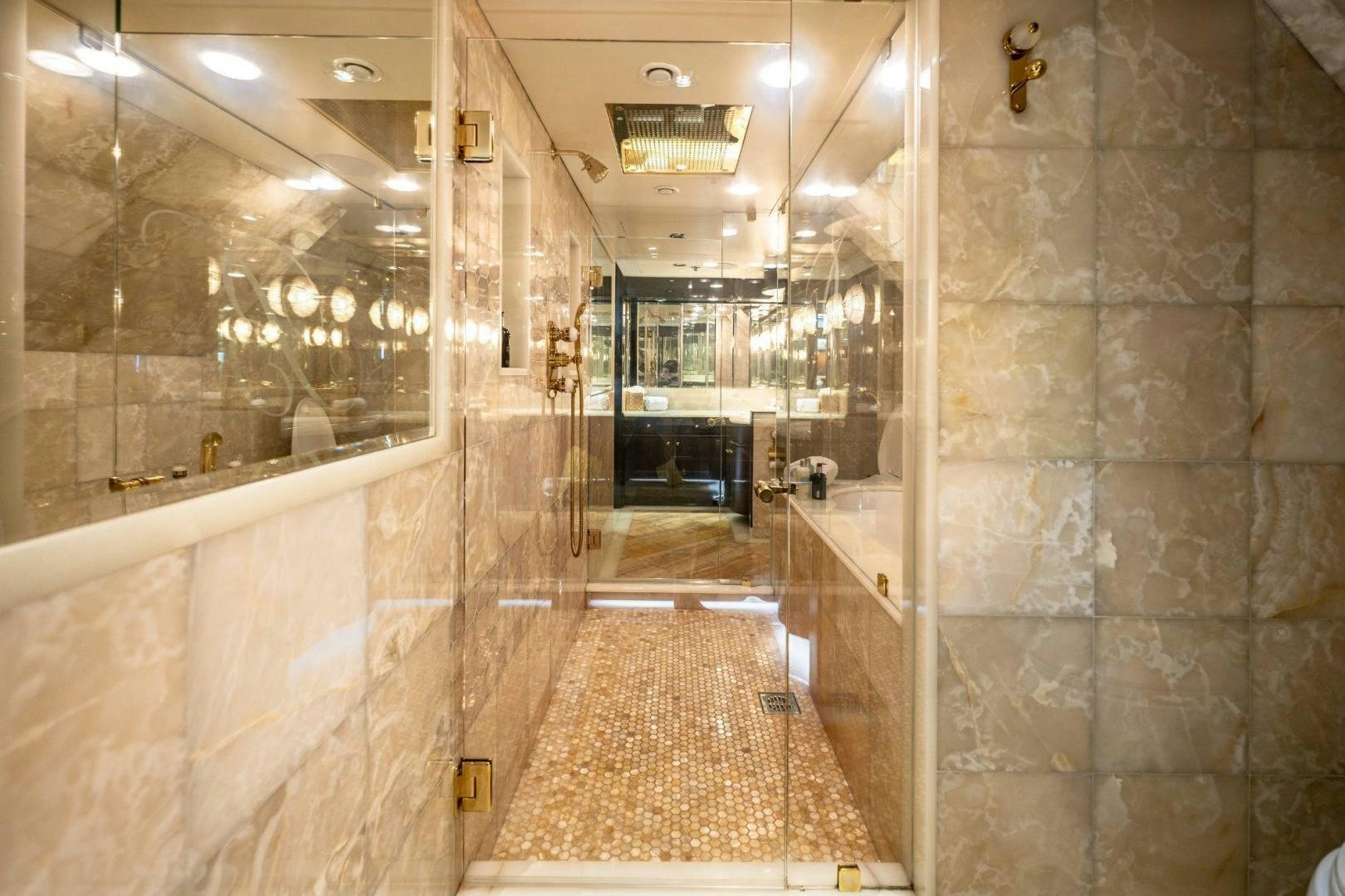 a bathroom with a shower and a sink aboard GRADE I Yacht for Sale