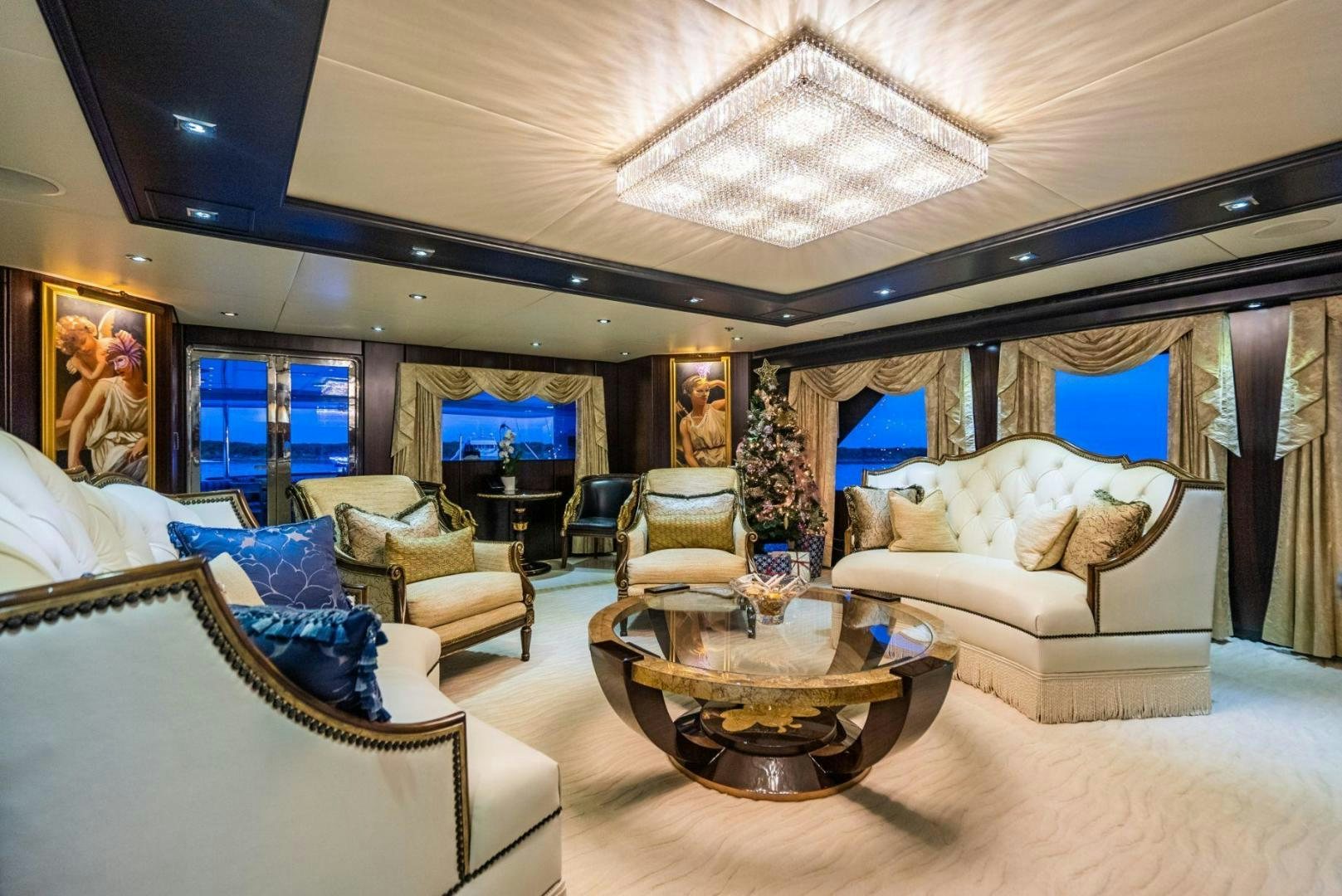 a living room with a large window aboard GRADE I Yacht for Sale