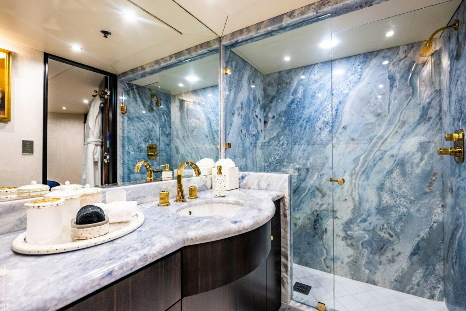 a bathroom with a large mirror aboard GRADE I Yacht for Sale