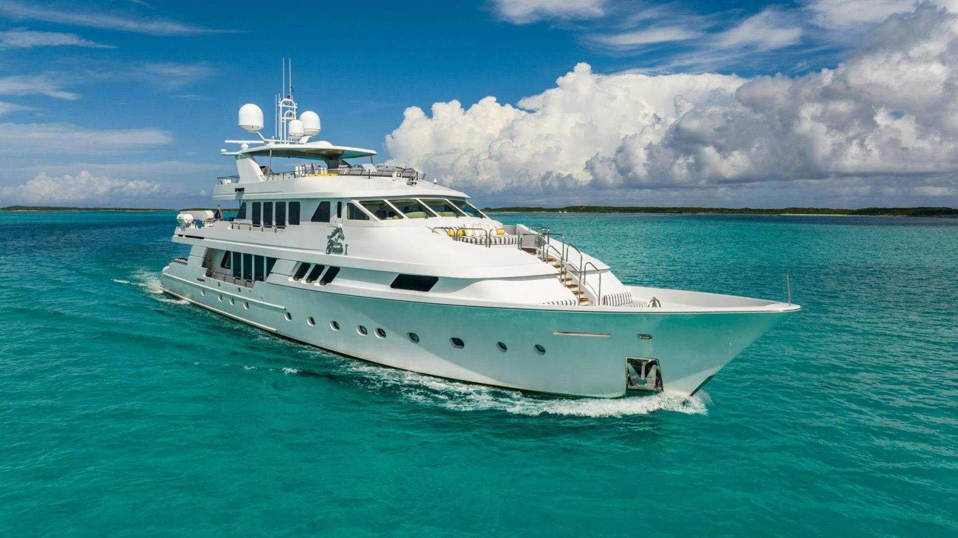 a white yacht in the water aboard GRADE I Yacht for Sale