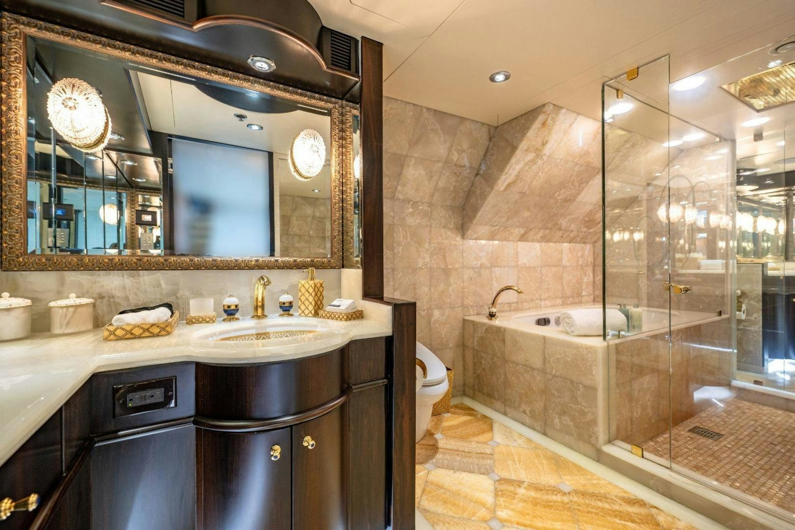 a bathroom with a large mirror aboard GRADE I Yacht for Sale