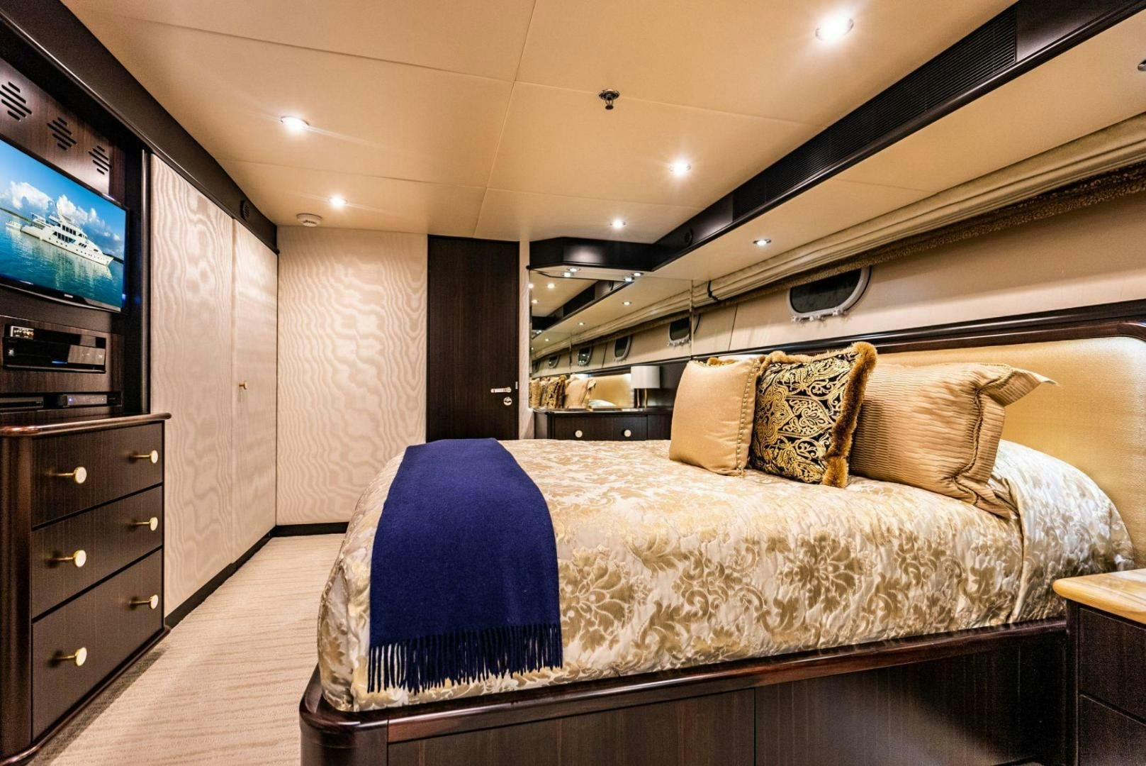 a bed in a room aboard GRADE I Yacht for Sale