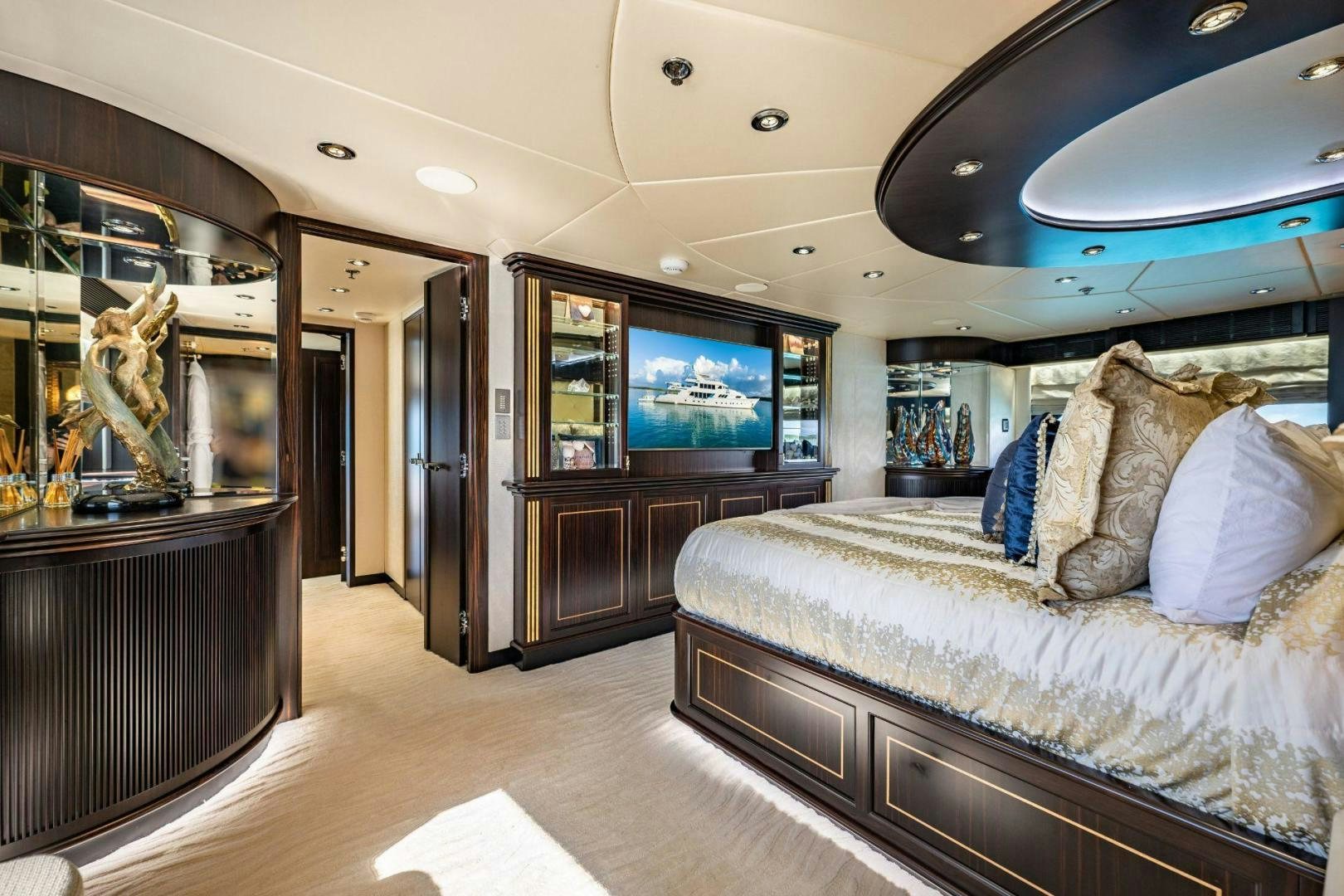 a large room with a couch and a tv aboard GRADE I Yacht for Sale
