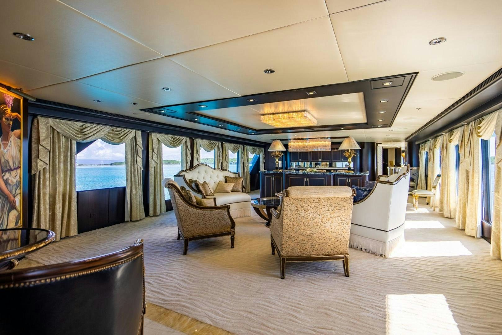 a living room with a large window aboard GRADE I Yacht for Sale