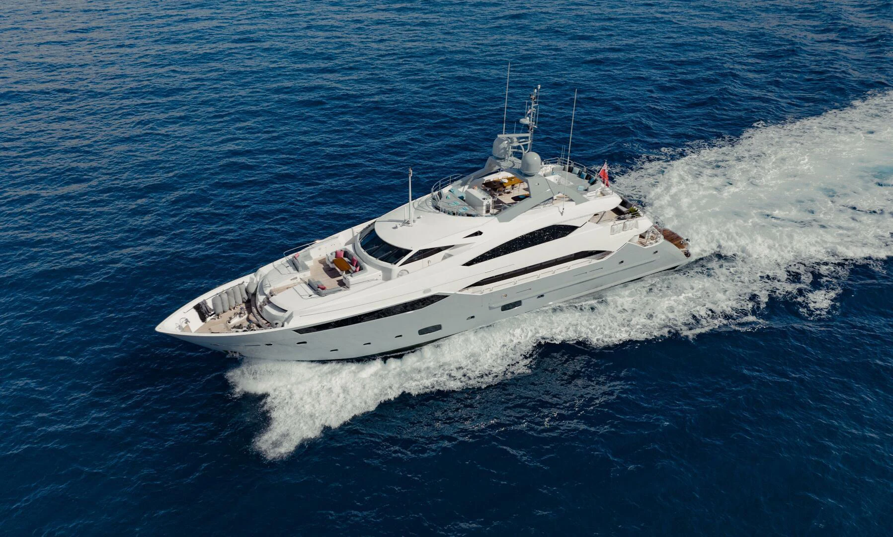 a white boat on the water aboard TAYRONA Yacht for Sale