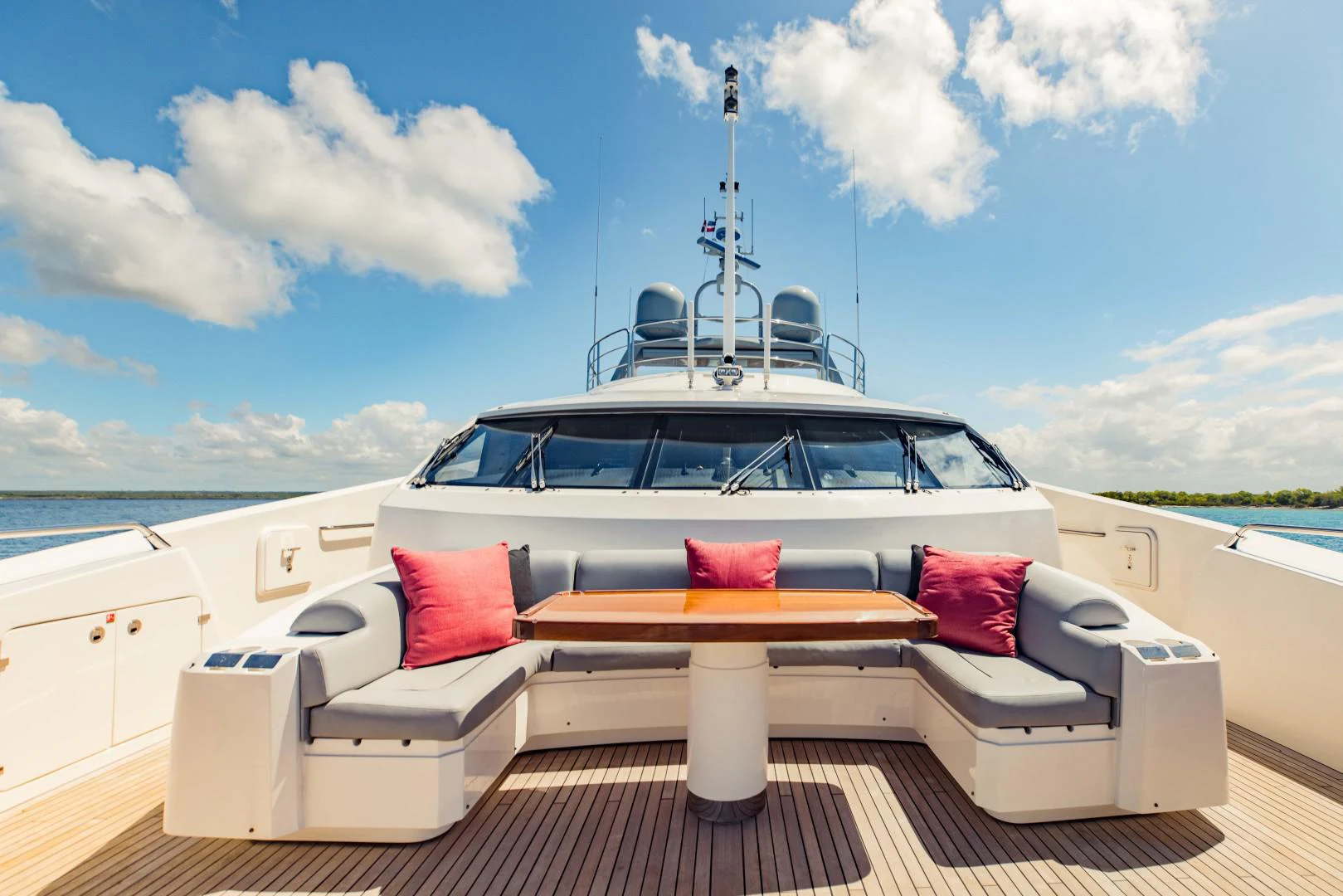 a white boat on a dock aboard TAYRONA Yacht for Sale