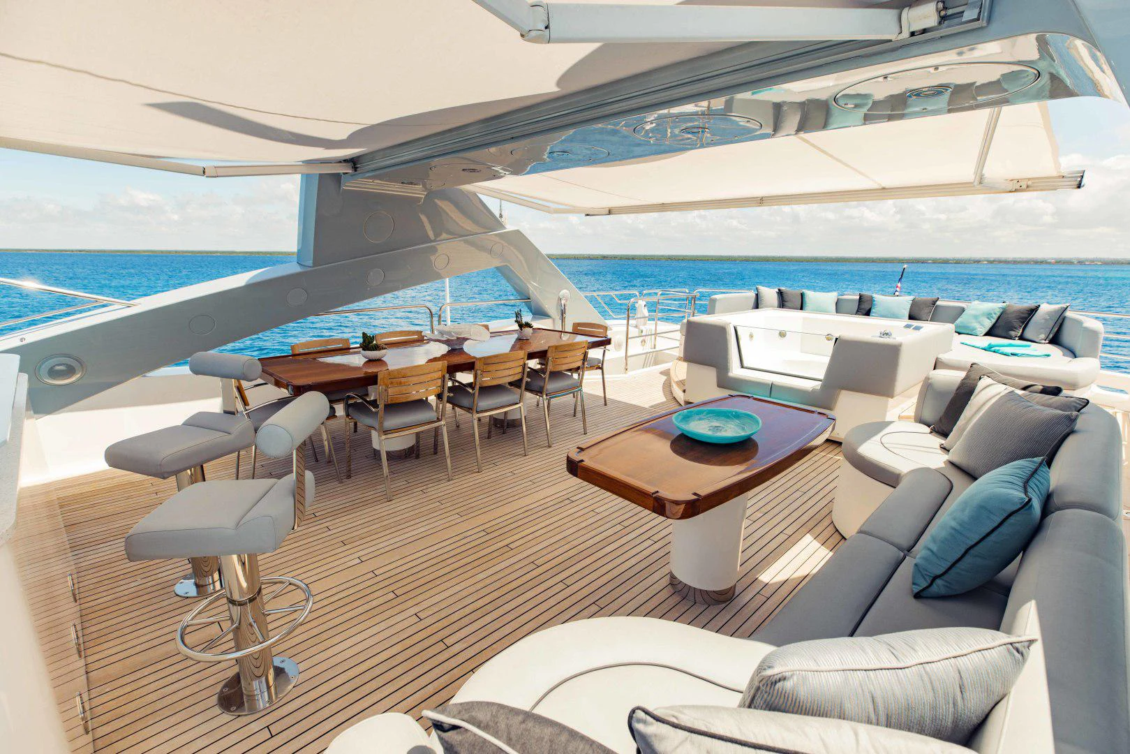 a room with a table and chairs aboard TAYRONA Yacht for Sale