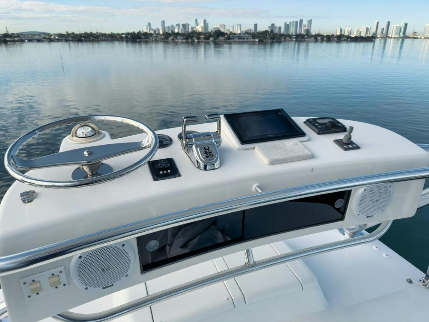 a boat with a view of a city in the background aboard 68 VIKING Yacht for Sale