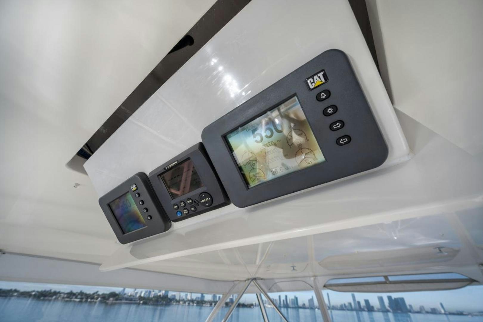 a couple of cell phones aboard 68 VIKING Yacht for Sale