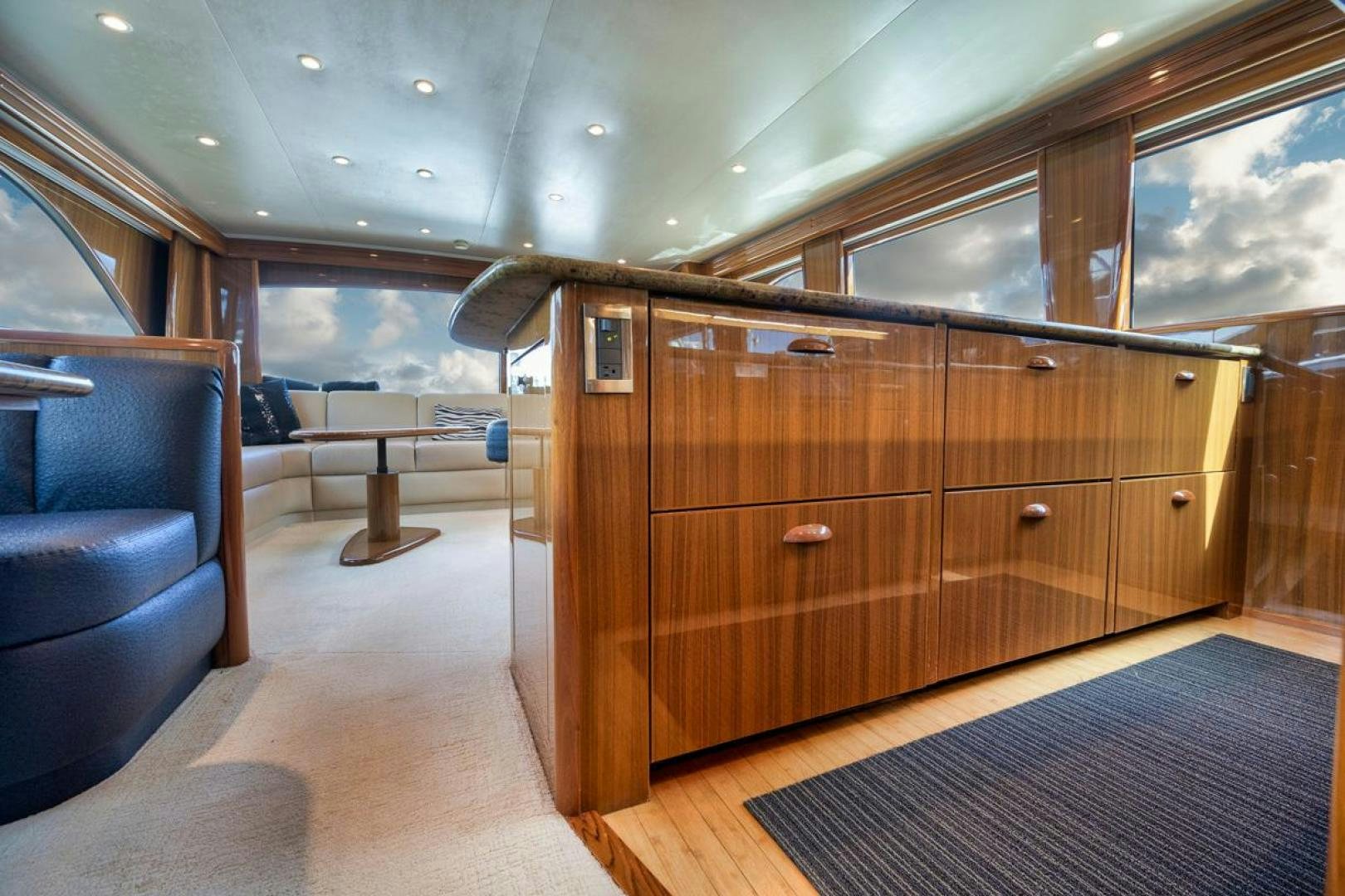 a room with a wood cabinet aboard 68 VIKING Yacht for Sale