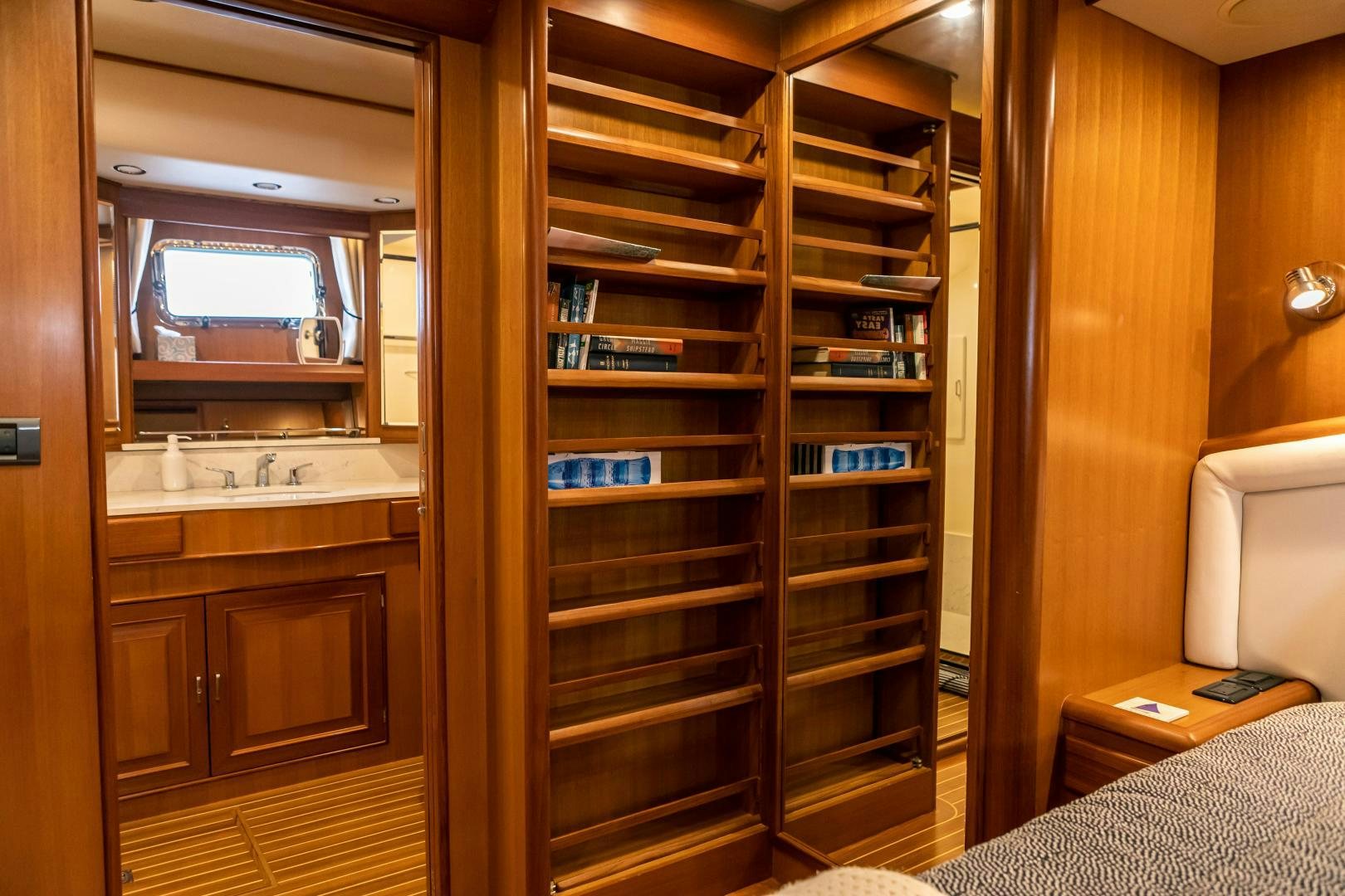 a room with a shelf and a bed aboard PRETTY LADY Yacht for Sale