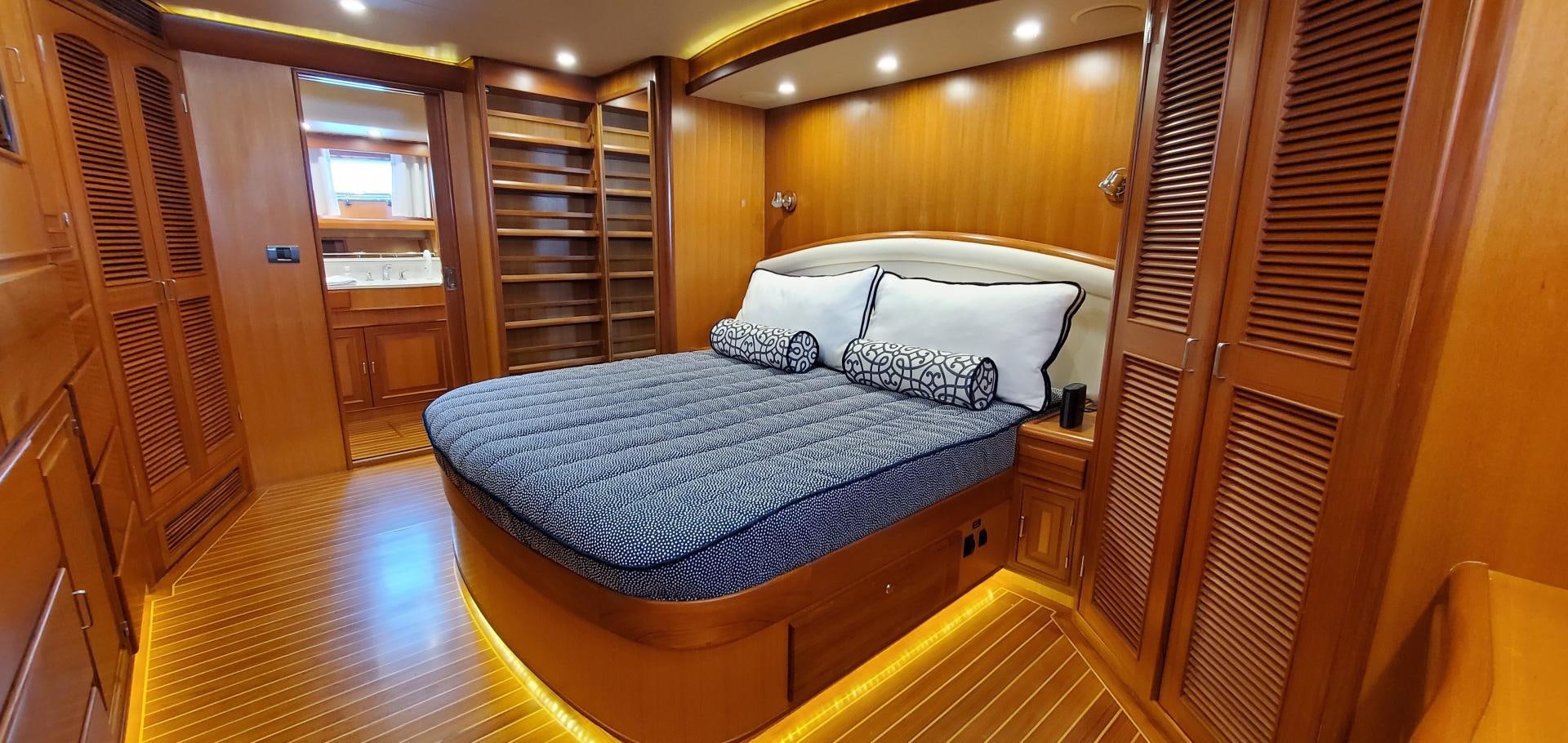 a bed in a room aboard PRETTY LADY Yacht for Sale