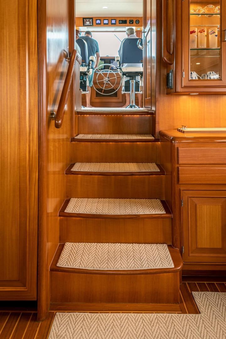 a wooden door with a mirror aboard PRETTY LADY Yacht for Sale