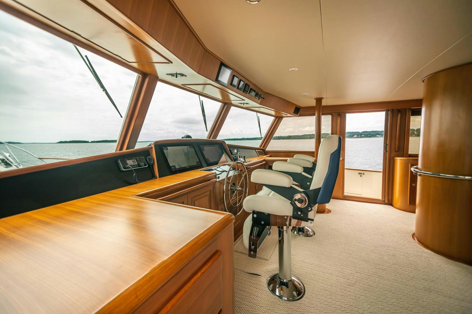a room with a car and a chair in it aboard PRETTY LADY Yacht for Sale