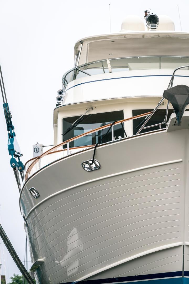 a white boat with a white sail aboard PRETTY LADY Yacht for Sale
