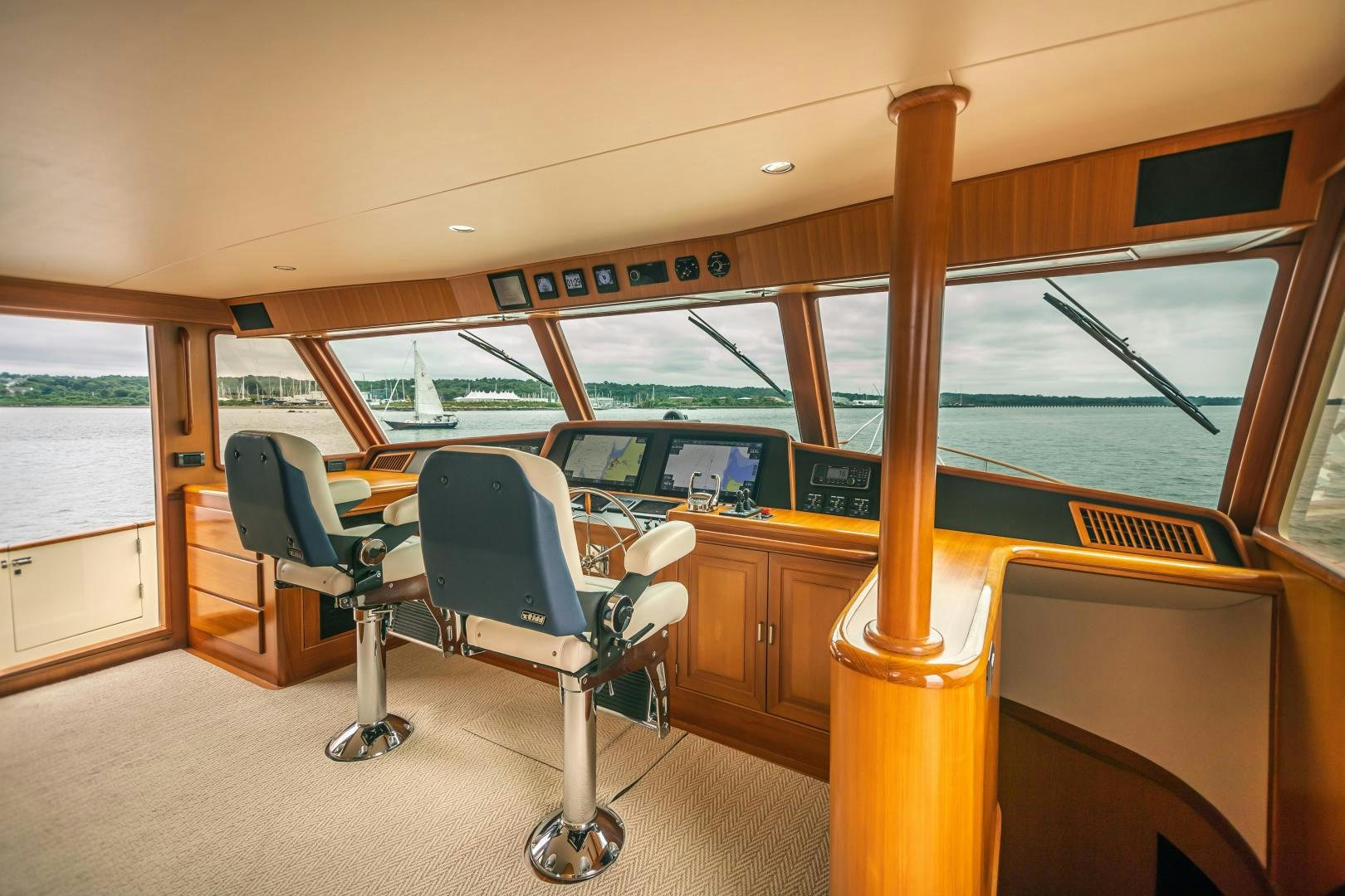 a room with a desk and chairs aboard PRETTY LADY Yacht for Sale
