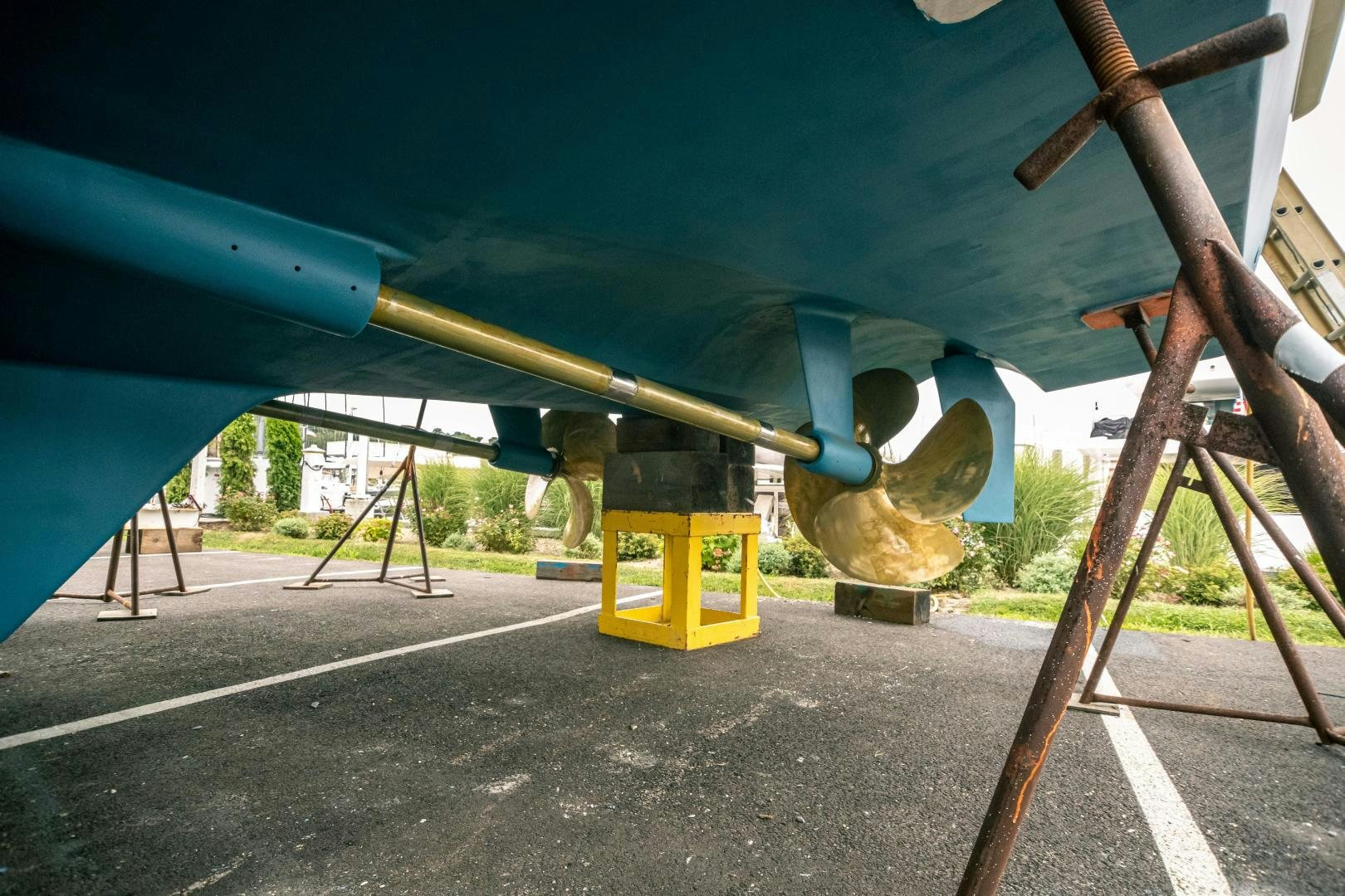 a large metal structure with a large pipe and a yellow sign aboard PRETTY LADY Yacht for Sale