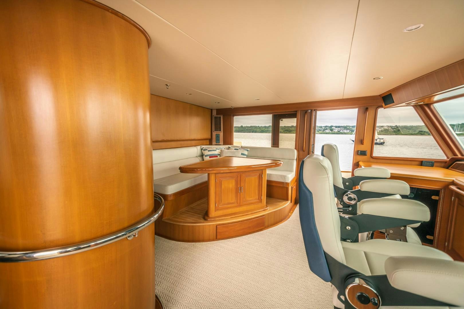 a room with a table and chairs aboard PRETTY LADY Yacht for Sale