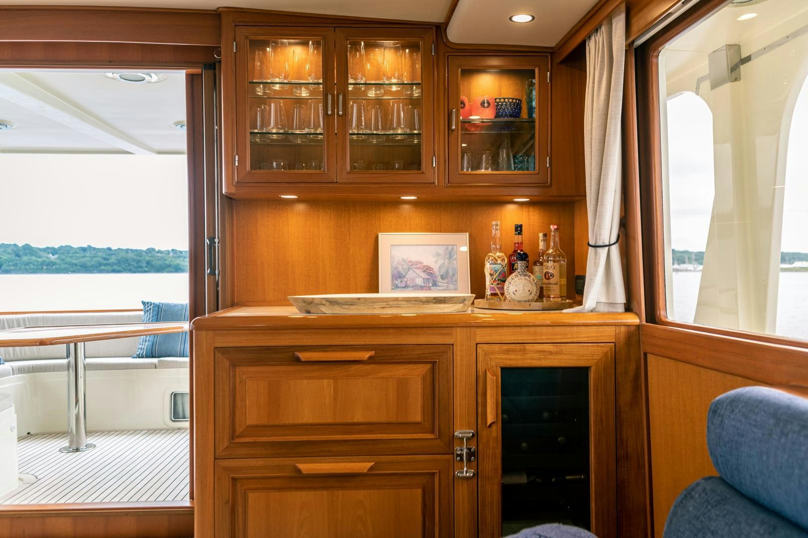 a kitchen with wooden cabinets aboard PRETTY LADY Yacht for Sale