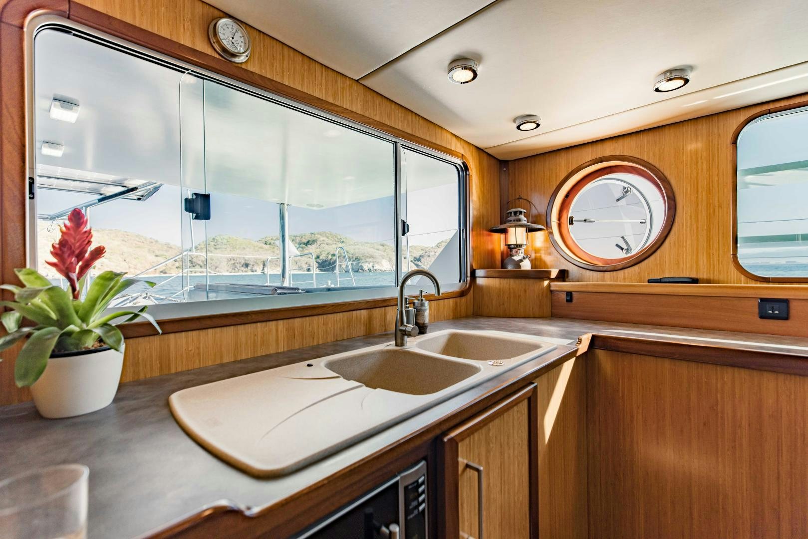 a bathroom with a large mirror aboard IETA Yacht for Sale