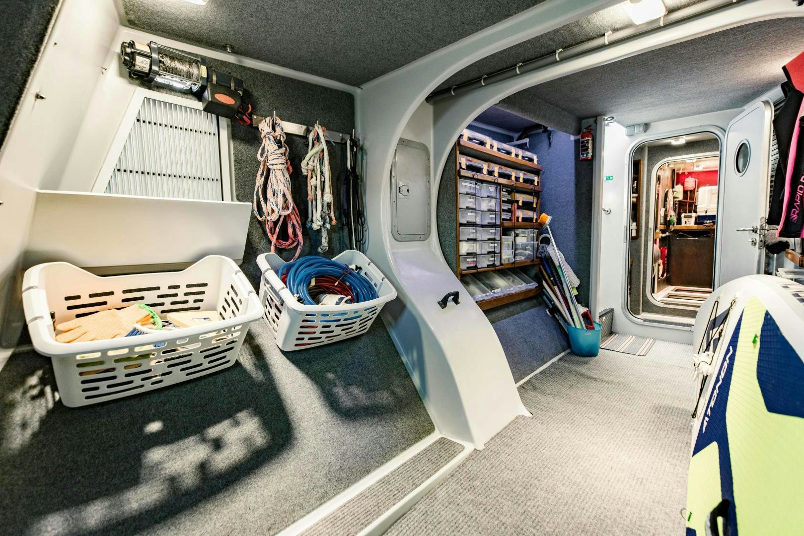 a room with a bed and a crate in it aboard IETA Yacht for Sale