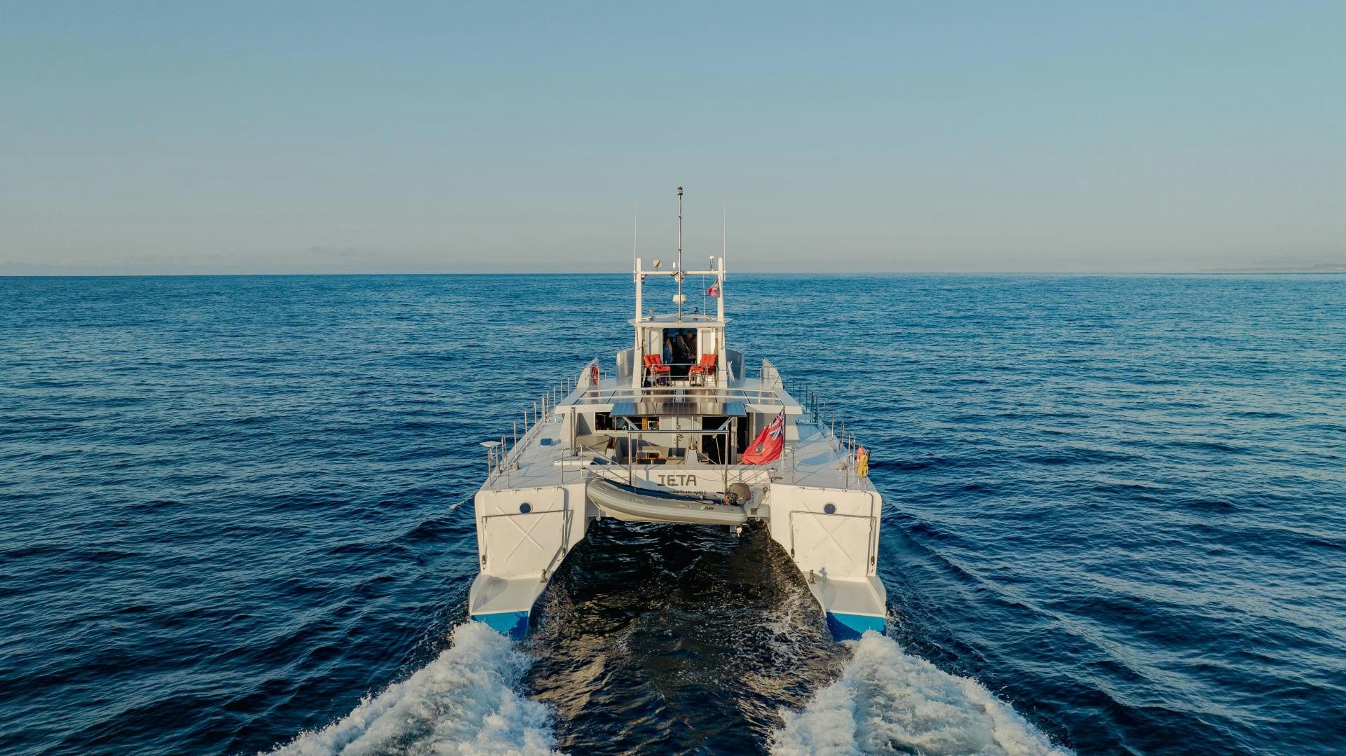 a boat in the water aboard IETA Yacht for Sale