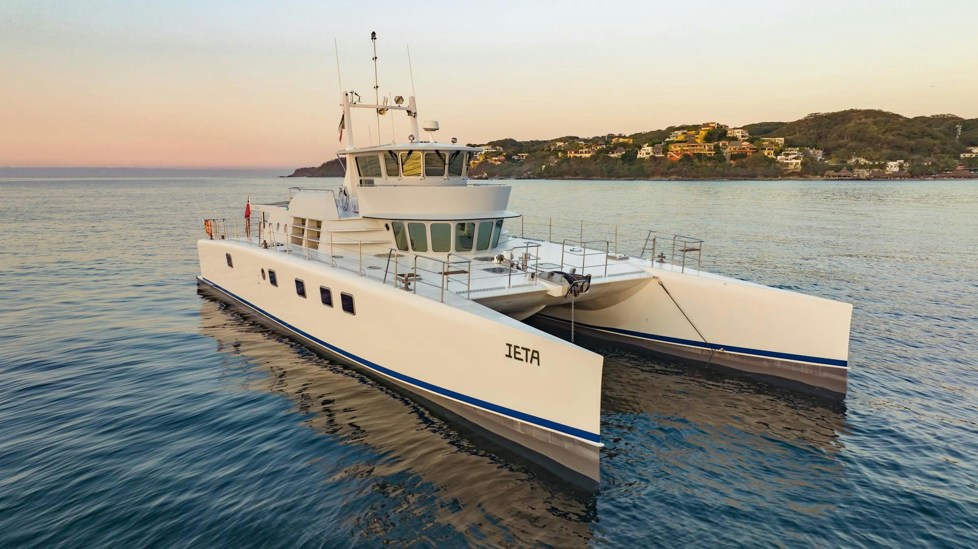 a couple of boats in the water aboard IETA Yacht for Sale