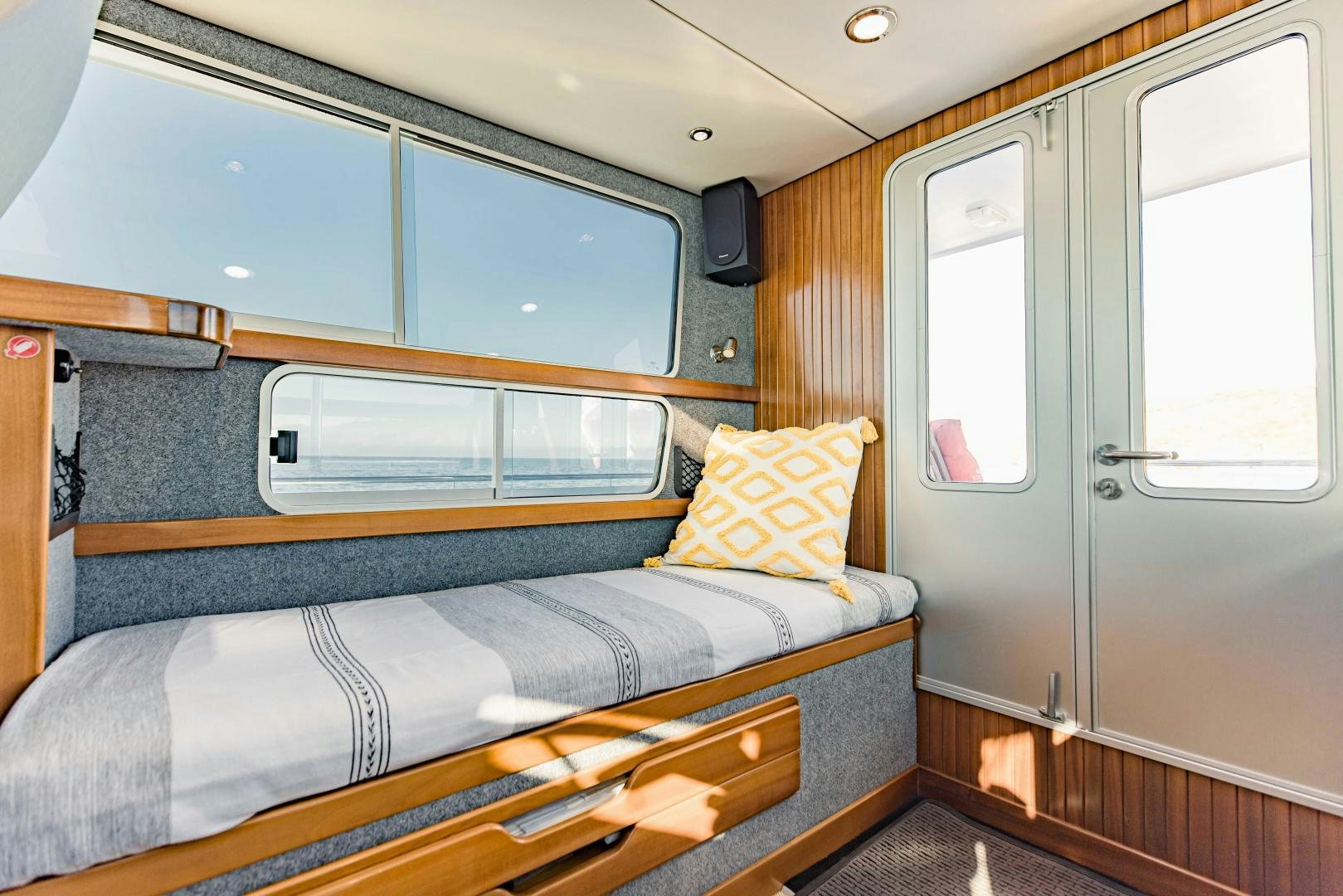 a bed in a room aboard IETA Yacht for Sale