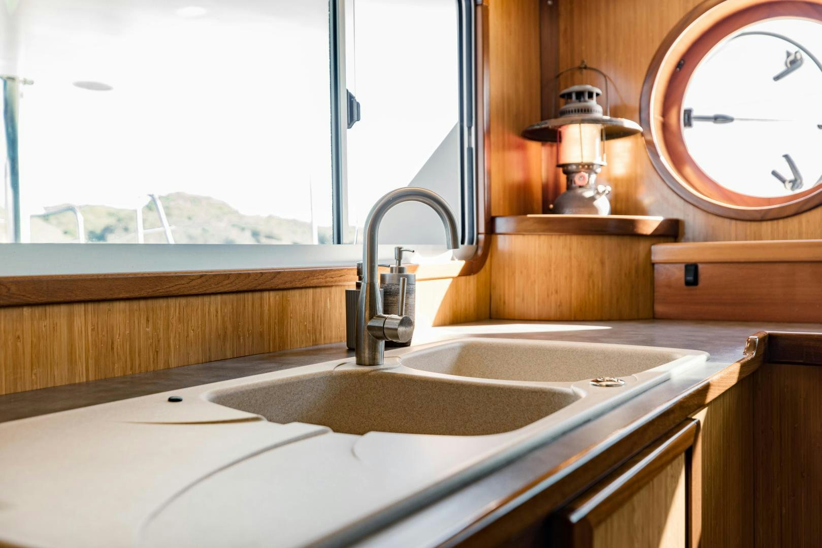 a bathroom with a sink and a mirror aboard IETA Yacht for Sale