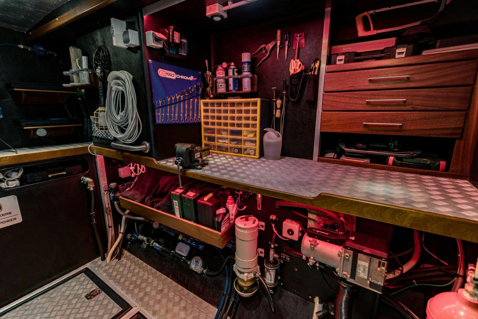 a room with a desk and computer aboard IETA Yacht for Sale