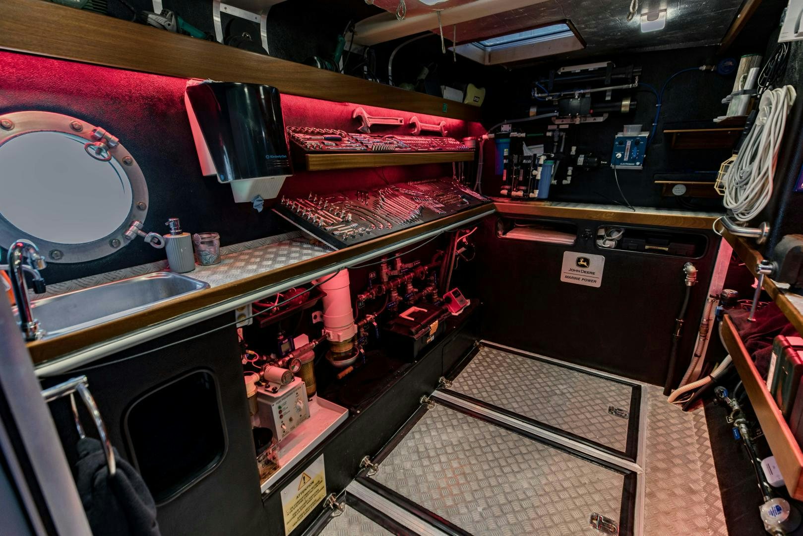 a room with a sink and a machine aboard IETA Yacht for Sale