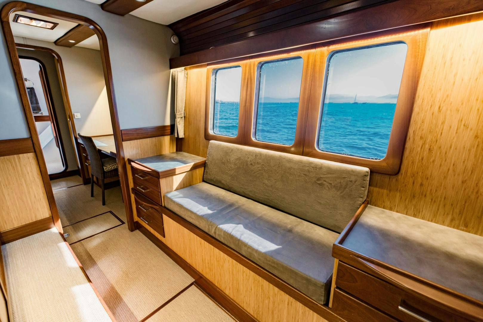 a couch in a room aboard IETA Yacht for Sale