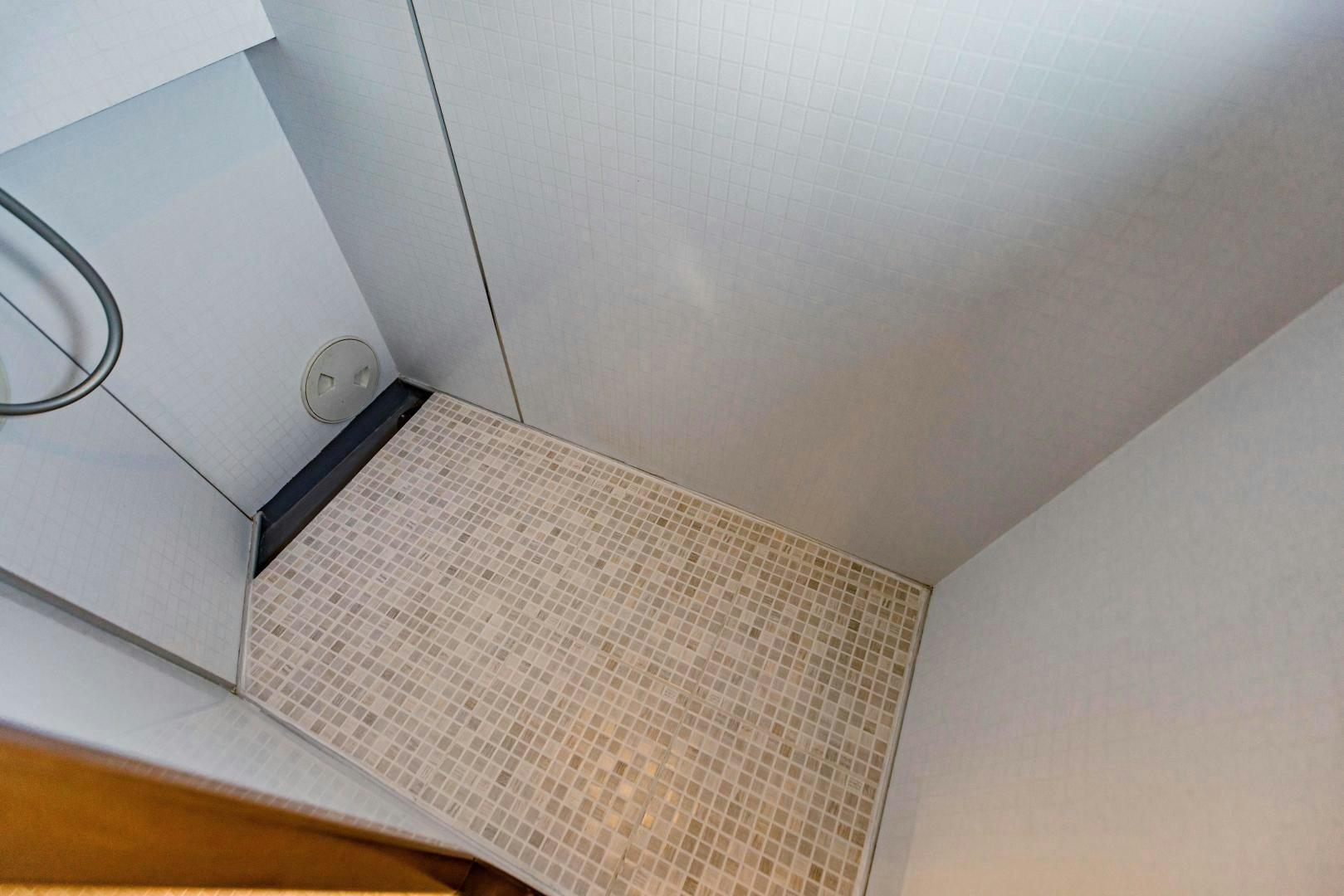 a white and grey rug on a white surface aboard IETA Yacht for Sale