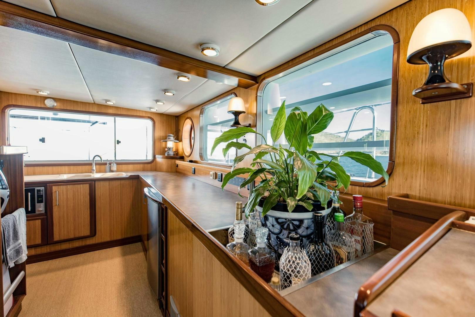a kitchen with a countertop and cabinets aboard IETA Yacht for Sale